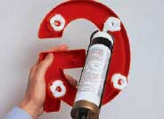 how to install building letters with pad mounts step two
