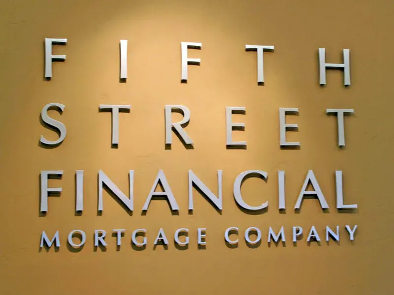 cut out metal letters on lobby wall of fifth street mortgage