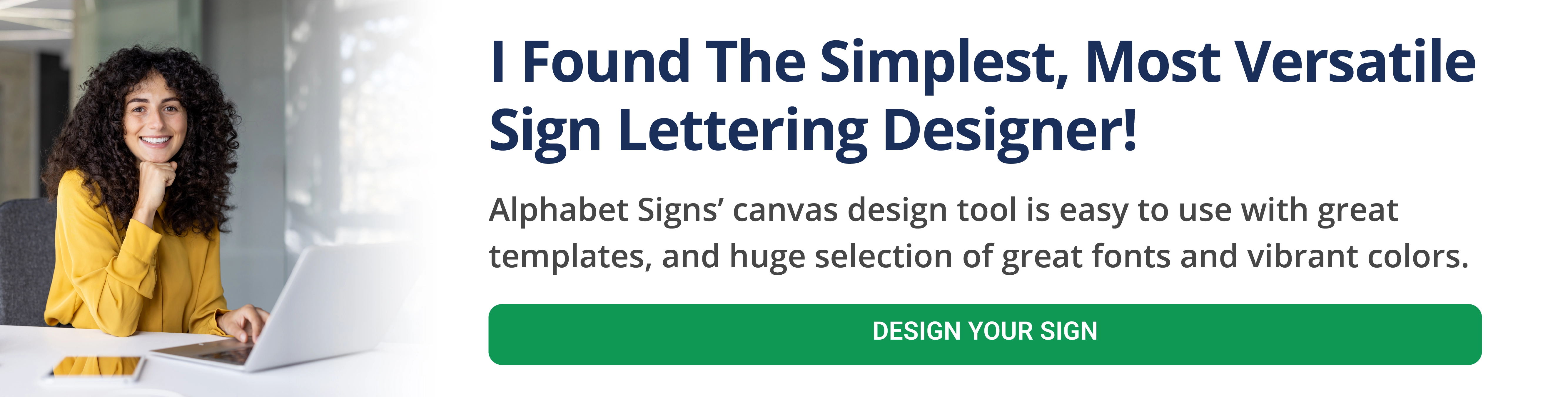 graphic artist working at desk with laptop design sign letter decals