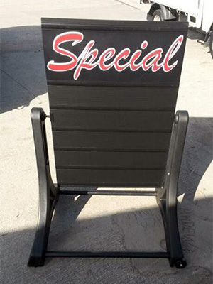 Swinger sidewalk sign black message board with Deluxifier header panel